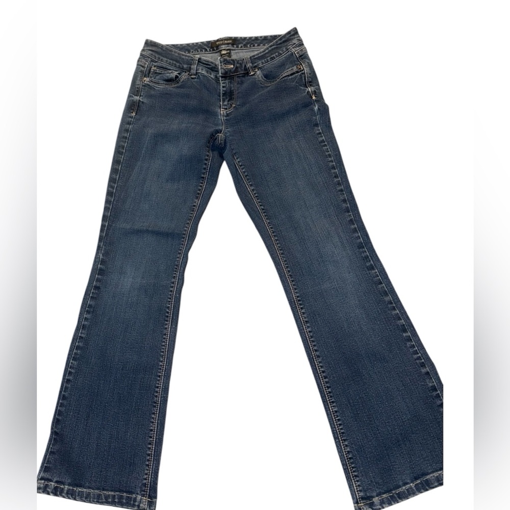 Black and white women’s jeans size 4s boot leg blue used